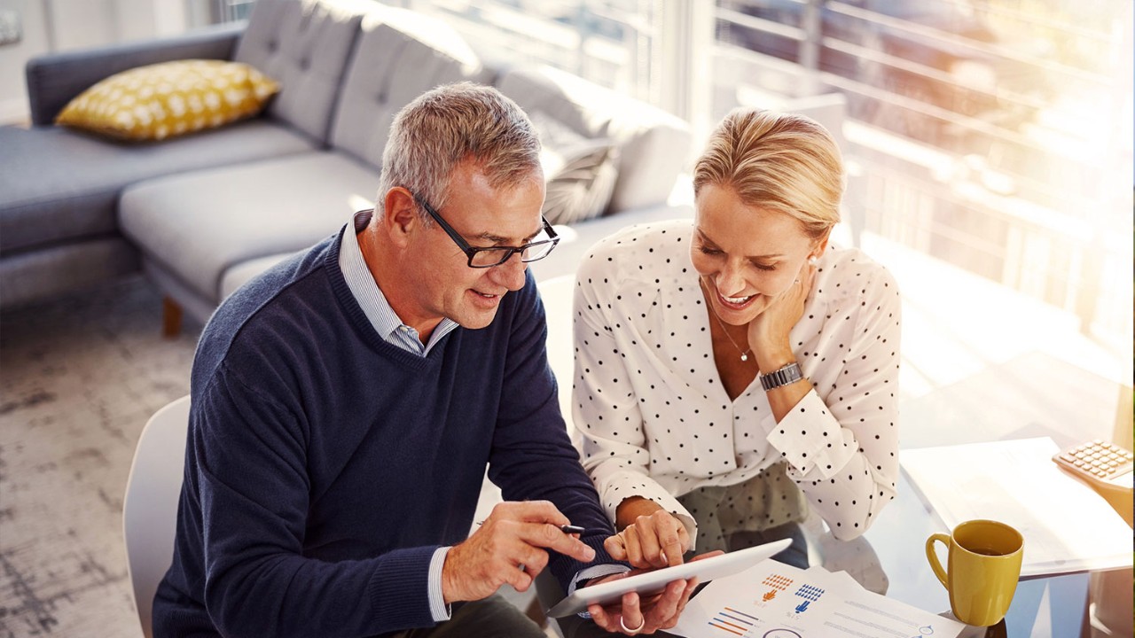 older couple looking at papers