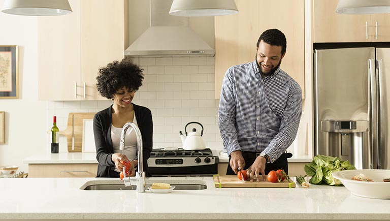 couple cooking in a kitchen